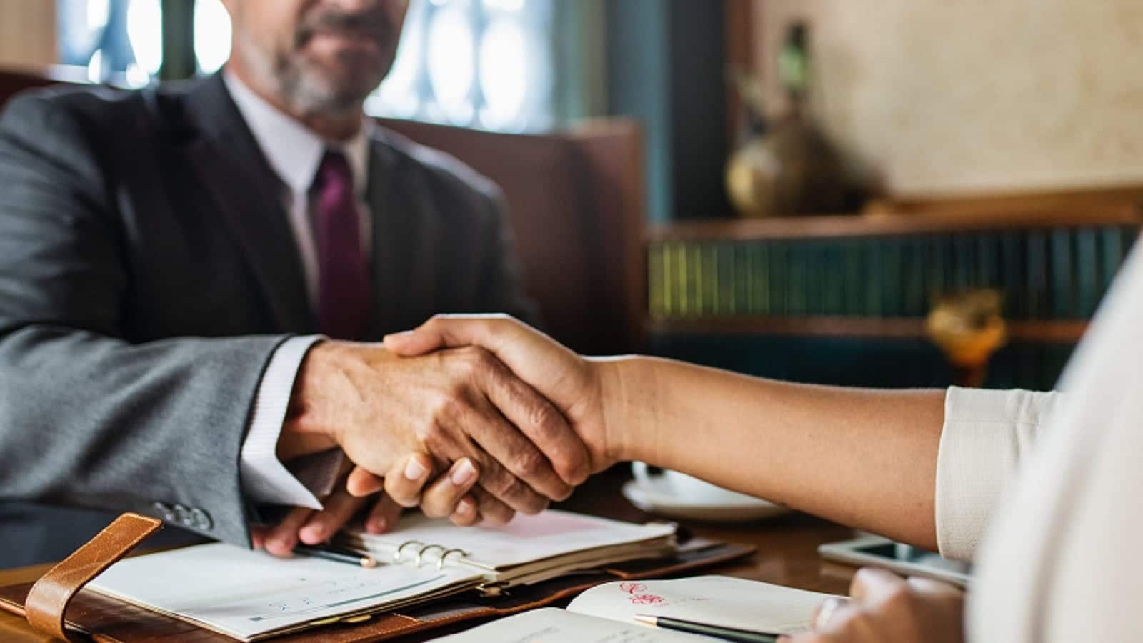 Attorney Shaking Hands With Client
