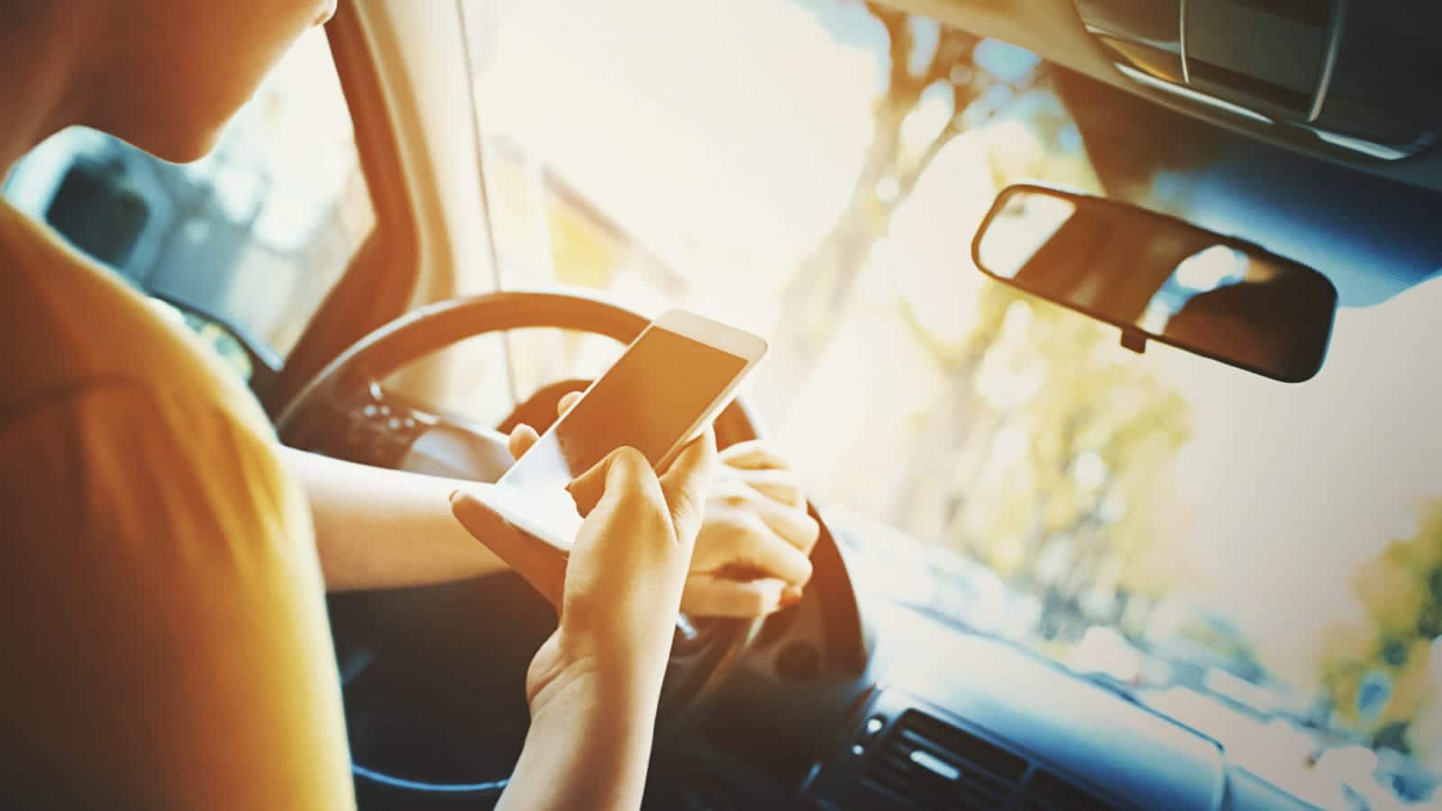 Texting While Driving Stock Photo