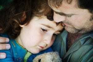A photo of a father and his daughter, who is a client of a Lafayette wrongful death attorney due to negligence in a car accident.