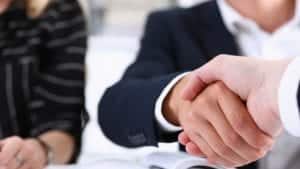 Attorney Shaking Hands With A Client Stock Photo